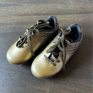 Toddler size 8 gold and black soccer cleats NWOT